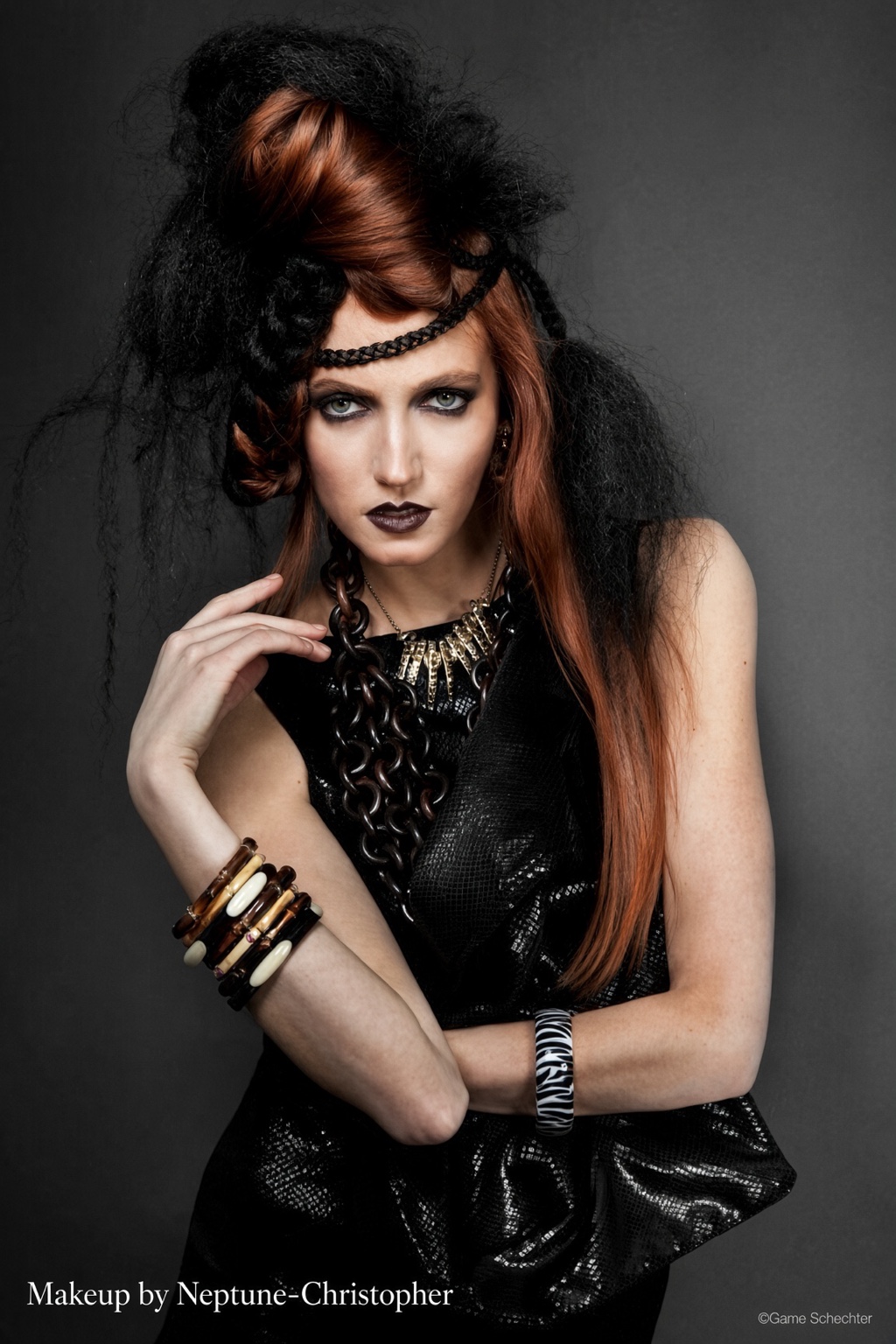 Avant-garde fashion makeup with smoked eyes and dark glossy lip